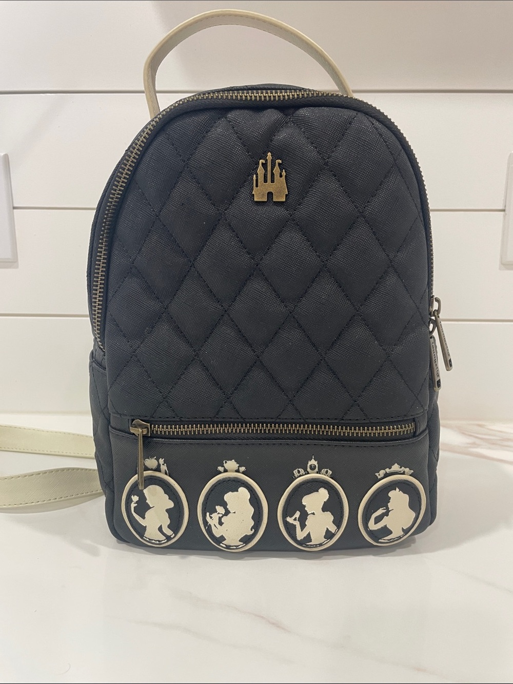 Loungefly Black Quilted Mini Backpack with Cream Handle and Cameos